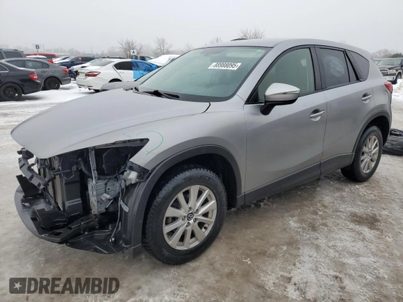 2015 Mazda CX-5 Sport with VIN JM3KE4BEXF0499688, listed as a Copart auction lot 88988095 with 258,460 mi miles and Salvage title. Bid and sale history available at DreamBid. Image 1.