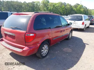 2006 Chrysler Town & Country SWB with VIN 1A4GP45R76B572053, listed as a IAAI auction lot 42015562 with 310,509 mi miles. Bid and sale history available at carsss.com. Image 4.