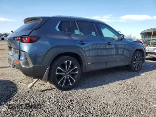 2023 Mazda CX-50 S Premium Plus with VIN 7MMVABEM8PN129773, listed as a Copart auction lot 82489824 with 31,567 mi miles and Salvage Title. Bid and sale history available at DreamBid. Image 3.