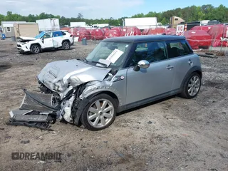 2007 MINI Hardtop S with VIN WMWMF73537TL88038, listed as a IAAI auction lot 42200252 with 70,603 mi miles and . Bid and sale history available at DreamBid. Image 18.