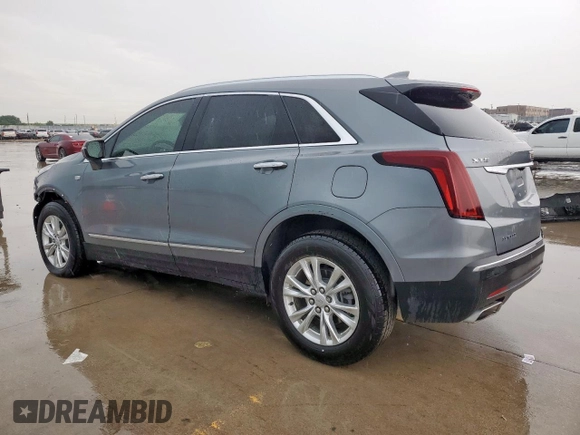 2022 Cadillac XT5 FWD Luxury z VIN 1GYKNAR47NZ116377, wystawiony jako Copart lot #55828415 z przebiegiem 62 276 mil mil oraz Czysty tytuł • Clean title. Historia ofert i sprzedaży dostępna na DreamBid. Obrazek 2.