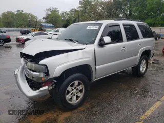 2004 Chevrolet Tahoe LT with VIN 1GNEC13Z34J124204, listed as a Copart auction lot 50416135 with 310,955 mi miles and Salvage Title. Bid and sale history available at carsss.com. Image 1.