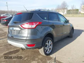 2015 Ford Escape Titanium with VIN 1FMCU9J90FUB58306, listed as a IAAI auction lot 41815151 with 136,835 mi miles. Bid and sale history available at carsss.com. Image 4.
