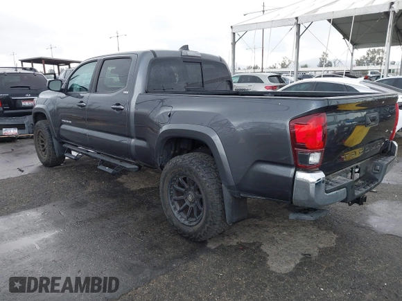 2022 Toyota Tacoma SR5 with VIN 3TMBZ5DN2NM034561, listed as a IAAI auction lot 40867443 with 51,728 mi miles and . Bid and sale history available at DreamBid. Image 3.