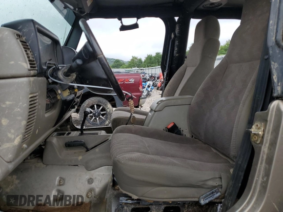 2004 Jeep Wrangler Rubicon with VIN 1J4FA69S94P774219, listed as a Copart auction lot 62806594 with 121,819 mi miles and Salvage Title. Bid and sale history available at carsss.com. Image 7.