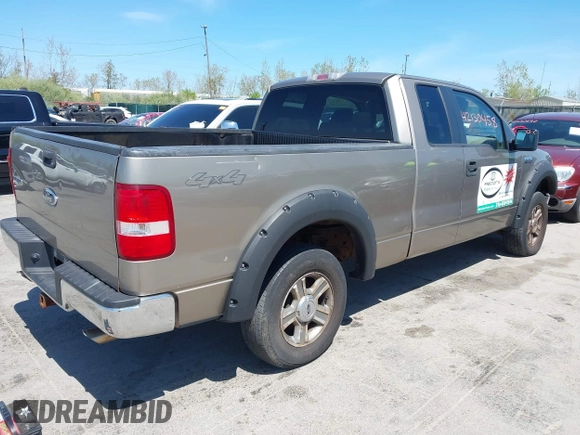 2005 Ford F-150 XLT with VIN 1FTPX14535FB40621, listed as a IAAI auction lot 42130458 with 122,764 mi miles. Bid and sale history available at carsss.com. Image 4.