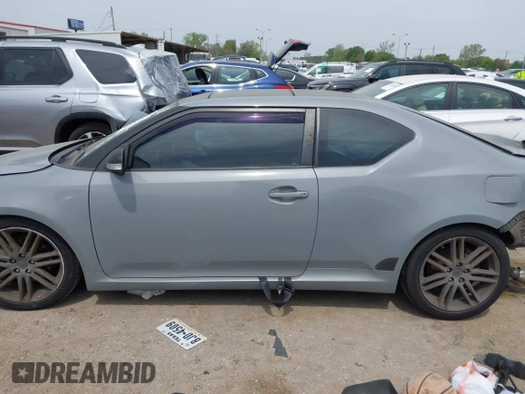 2013 Scion tC with VIN JTKJF5C7XD3046764, listed as a IAAI auction lot 41881930 with 87,701 mi miles. Bid and sale history available at carsss.com. Image 14.