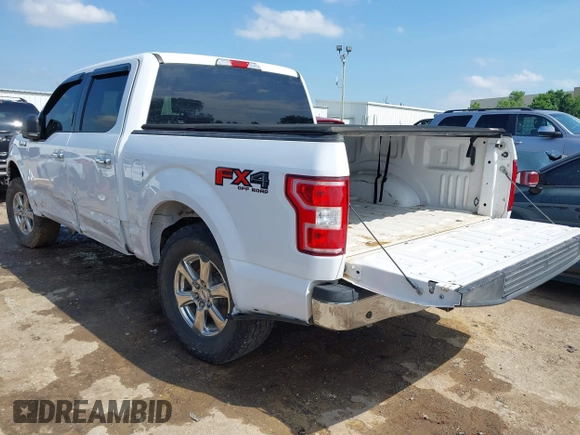 2018 Ford F-150 XL with VIN 1FTEW1EP9JKE58173, listed as a IAAI auction lot 42389998 with 129,512 mi miles and . Bid and sale history available at DreamBid. Image 3.