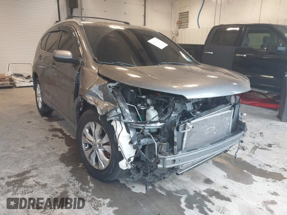 2012 Honda CR-V EX-L z VIN JHLRM4H78CC017235, wystawiony jako IAAI lot #42318504 z przebiegiem 161 069 mil mil oraz . Historia ofert i sprzedaży dostępna na DreamBid. Obrazek 1.