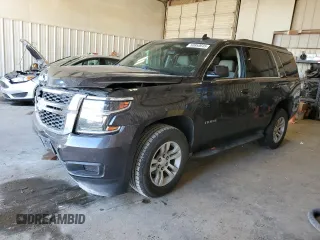2015 Chevrolet Tahoe LS with VIN 1GNSCAKC5FR501801, listed as a Copart auction lot 50850645 with 112,896 mi miles and Salvage title. Bid and sale history available at DreamBid. Image 1.