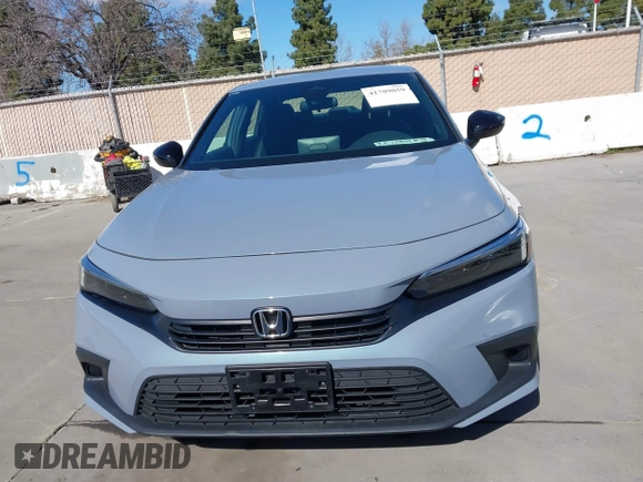 2022 Honda Civic Sport with VIN 2HGFE2F57NH600299, listed as a IAAI auction lot 41709059 with 9,060 mi miles and . Bid and sale history available at carsss.com. Image 13.
