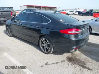 2017 Ford Fusion Titanium with VIN 3FA6P0K91HR257462, listed as a IAAI auction lot 42079361 with 124,914 mi miles and . Bid and sale history available at DreamBid. Image 3.