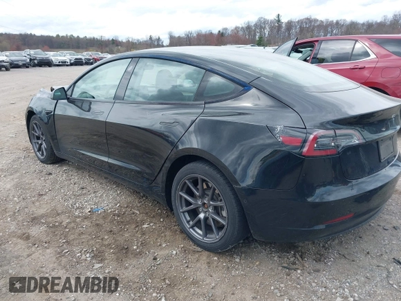 2021 Tesla Model 3 Long Range with VIN 5YJ3E1EB4MF012822, listed as a IAAI auction lot 41918721 with 69,105 mi miles. Bid and sale history available at carsss.com. Image 3.