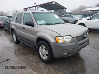 2001 Ford Escape XLT with VIN 1FMYU041X1KE70466, listed as a IAAI auction lot 41542707 with 182,364 mi miles. Bid and sale history available at carsss.com. Image 1.