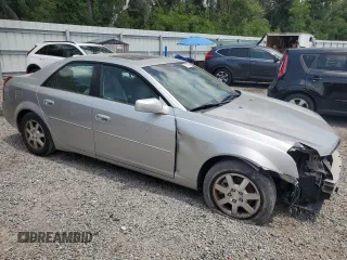 2006 Cadillac CTS with VIN 1G6DM57T860124659, listed as a Copart auction lot 57287985 with 141,162 mi miles and Salvage title. Bid and sale history available at DreamBid. Image 4.
