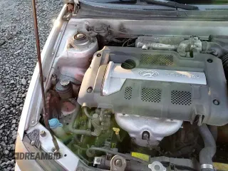 2004 Hyundai Elantra GT z VIN KMHDN56D64U107770, wystawiony jako Copart lot #84436064 z przebiegiem 285 779 mil mil oraz Szkoda całkowita • Salvage title. Historia ofert i sprzedaży dostępna na DreamBid. Obrazek 13.