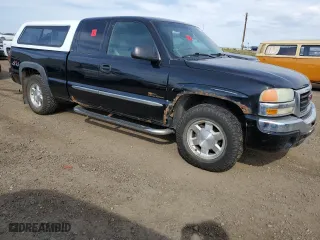2004 GMC Sierra 1500 SLT with VIN 1GTEK19T14E310475, listed as a Copart auction lot 71742464 with 0 mi miles and Salvage Title. Bid and sale history available at carsss.com. Image 4.