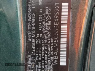 2011 BMW Z4 sDrive30i with VIN WBALM5C55BE495921, listed as a Copart auction lot 71453304 with 116,136 mi miles and Salvage Title. Bid and sale history available at carsss.com. Image 12.