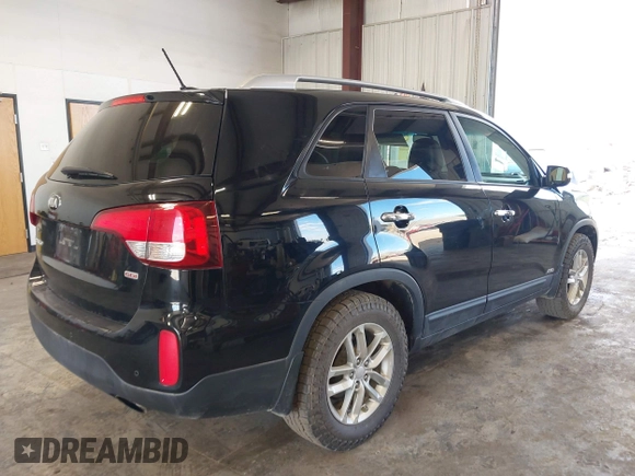 2014 Kia Sorento LX with VIN 5XYKTCA64EG541574, listed as a IAAI auction lot 42067910 with 144,234 mi miles and . Bid and sale history available at carsss.com. Image 4.