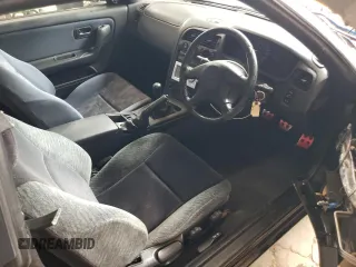 1997 Nissan Skyline z VIN HR33101590, wystawiony jako Copart lot #68650354 z przebiegiem 76 082 mil mil oraz Szkoda całkowita • Salvage title. Historia ofert i sprzedaży dostępna na DreamBid. Obrazek 8.