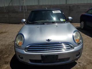 2010 MINI Convertible with VIN WMWMR3C5XATU98379, listed as a Copart auction lot 56360255 with 108,414 mi miles and Clean Title. Bid and sale history available at DreamBid. Image 5.