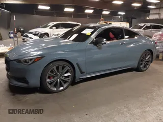 2022 Infiniti Q60 Red Sport 400 with VIN JN1FV7LL4NM681132, listed as a IAAI auction lot 40733343 with 14,309 mi miles and . Bid and sale history available at DreamBid. Image 2.