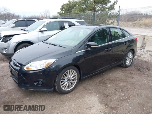 2012 Ford Focus SEL with VIN 1FAHP3H27CL348358, listed as a IAAI auction lot 41967061 with 146,432 mi miles. Bid and sale history available at carsss.com. Image 2.