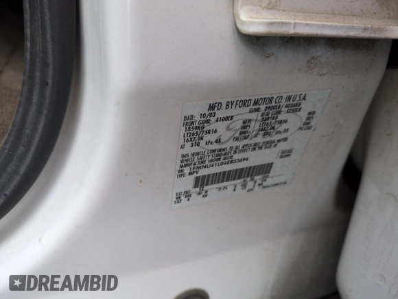 2004 Ford Excursion Special Serv with VIN 1FMNU41L04EB33694, listed as a Copart auction lot 55959735 with 183,692 mi miles and Salvage title. Bid and sale history available at DreamBid. Image 12.