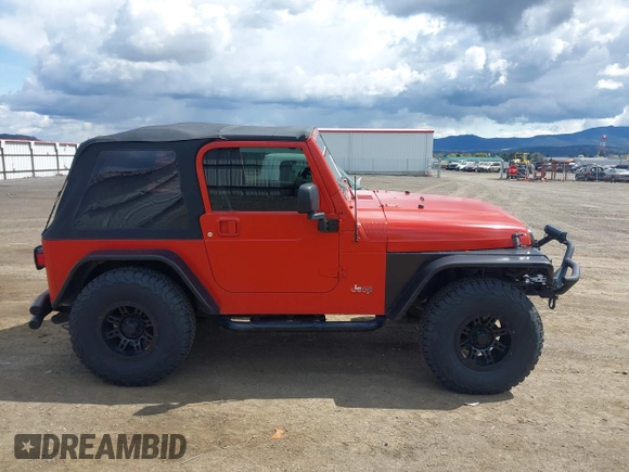 2005 Jeep Wrangler X with VIN 1J4FA39S35P358201, listed as a IAAI auction lot 42080407 with 130,110 mi miles. Bid and sale history available at carsss.com. Image 14.