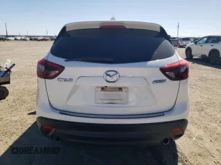 2016 Mazda CX-5 Touring with VIN JM3KE2CY7G0657113, listed as a Copart auction lot 46489835 with 166,399 mi miles and Salvage Title. Bid and sale history available at DreamBid. Image 6.