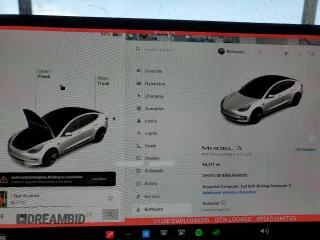2020 Tesla Model 3 Standard Range Plus with VIN 5YJ3E1EA6LF645215, listed as a Copart auction lot 47882375 with 69,317 mi miles and Salvage Title. Bid and sale history available at DreamBid. Image 9.
