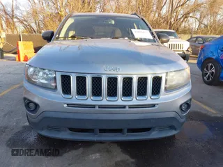 2016 Jeep Compass Sport with VIN 1C4NJCBA1GD743294, listed as a IAAI auction lot 41035177 with 124,379 mi miles. Bid and sale history available at carsss.com. Image 6.