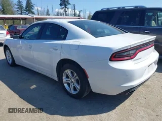 2022 Dodge Charger SXT with VIN 2C3CDXBG4NH197301, listed as a IAAI auction lot 42053688 with 60,592 mi miles and . Bid and sale history available at DreamBid. Image 3.