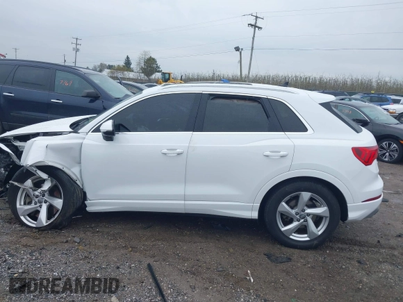2020 Audi Q3 Premium with VIN WA1AECF35L1030273, listed as a IAAI auction lot 42006553 with 81,944 mi miles. Bid and sale history available at carsss.com. Image 14.
