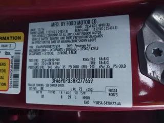 2017 Ford Fusion Energi SE with VIN 3FA6P0PU3HR277659, listed as a IAAI auction lot 41297011 with 119,244 mi miles. Bid and sale history available at carsss.com. Image 9.