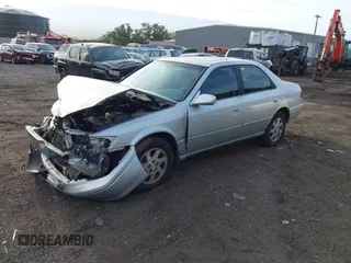 2000 Toyota Camry LE z VIN JT2BF28K6Y0282836, wystawiony jako IAAI lot #41799376 z przebiegiem 210 710 mil mil oraz . Historia ofert i sprzedaży dostępna na DreamBid. Obrazek 17.