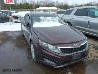 2011 Kia Optima EX with VIN KNAGN4A75B5158176, listed as a IAAI auction lot 41553536 with 140,785 mi miles. Bid and sale history available at carsss.com. Image 1.