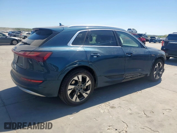 2021 Audi e-tron Premium Plus with VIN WA1LAAGE5MB030598, listed as a Copart auction lot 50411695 with 31,819 mi miles and Salvage title. Bid and sale history available at DreamBid. Image 3.