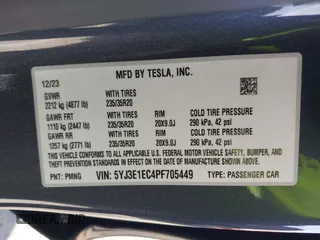2023 Tesla Model 3 Performance with VIN 5YJ3E1EC4PF705449, listed as a IAAI auction lot 41587026 with 30,292 mi miles. Bid and sale history available at carsss.com. Image 9.
