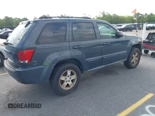 2007 Jeep Grand Cherokee Laredo with VIN 1J8GS48K17C684497, listed as a IAAI auction lot 42136314 with 155,024 mi miles. Bid and sale history available at carsss.com. Image 4.