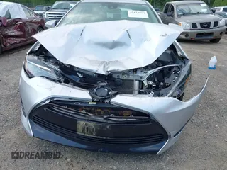 2018 Toyota Corolla L with VIN 2T1BURHE7JC038172, listed as a IAAI auction lot 42473864 with 83,657 mi miles and . Bid and sale history available at DreamBid. Image 6.