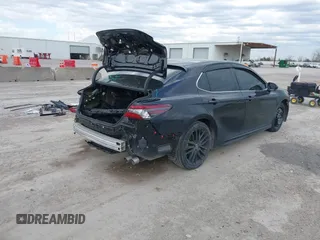 2022 Toyota Camry XSE z VIN 4T1K61AK2NU700840, wystawiony jako IAAI lot #41352884 z przebiegiem 98 634 mil mil oraz . Historia ofert i sprzedaży dostępna na DreamBid. Obrazek 4.