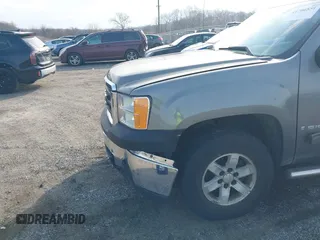 2009 GMC Sierra 1500 SLE with VIN 1GTEK29029Z101869, listed as a IAAI auction lot 41706551 with 151,208 mi miles. Bid and sale history available at carsss.com. Image 6.