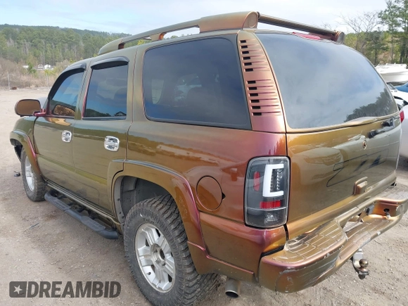 2003 Chevrolet Tahoe LT with VIN 1GNEK13Z23R302221, listed as a IAAI auction lot 41636853 with 264,525 mi miles. Bid and sale history available at carsss.com. Image 3.