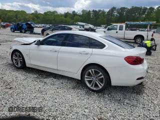 2021 BMW 4 Series 430i with VIN WBA4J1C57KBM15722, listed as a Copart auction lot 52690175 with 55,704 mi miles and Salvage Title. Bid and sale history available at DreamBid. Image 2.