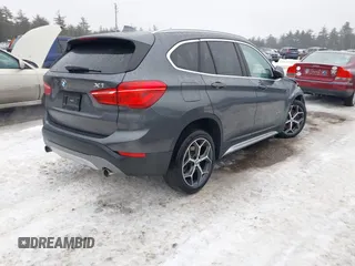 2016 BMW X1 xDrive28i with VIN WBXHT3C34GP880738, listed as a IAAI auction lot 41398105 with 113,445 mi miles and . Bid and sale history available at DreamBid. Image 4.