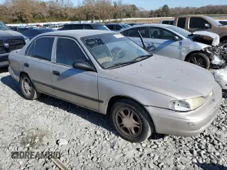 2000 Chevrolet Prizm z VIN 1Y1SK5284YZ407566, wystawiony jako Copart lot #86148464 z przebiegiem 193 844 mil mil oraz Szkoda całkowita • Salvage title. Historia ofert i sprzedaży dostępna na DreamBid. Obrazek 4.