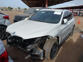 2018 BMW X1 sDrive28i with VIN WBXHU7C32J5H41587, listed as a IAAI auction lot 41538394 with 125,804 mi miles. Bid and sale history available at carsss.com. Image 18.