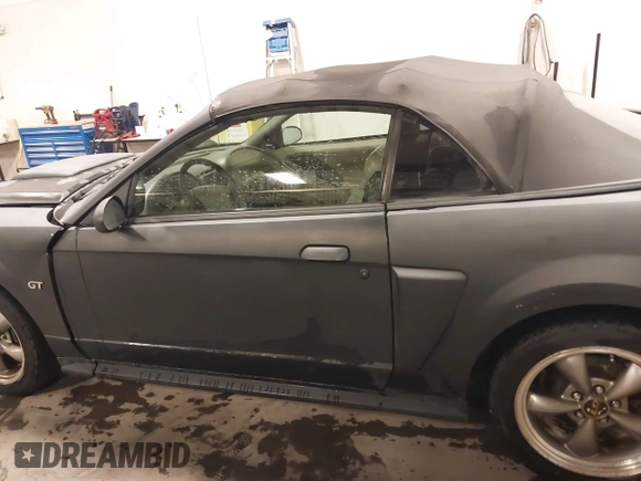 2002 Ford Mustang GT Deluxe z VIN 1FAFP45X92F176117, wystawiony jako IAAI lot #41619448 z przebiegiem 178 787 mil mil oraz . Historia ofert i sprzedaży dostępna na DreamBid. Obrazek 14.