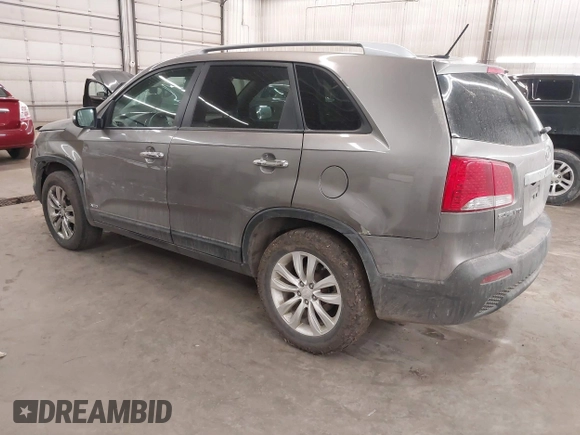 2011 Kia Sorento LX with VIN 5XYKTDA2XBG119730, listed as a IAAI auction lot 41754502 with 176,034 mi miles. Bid and sale history available at carsss.com. Image 3.